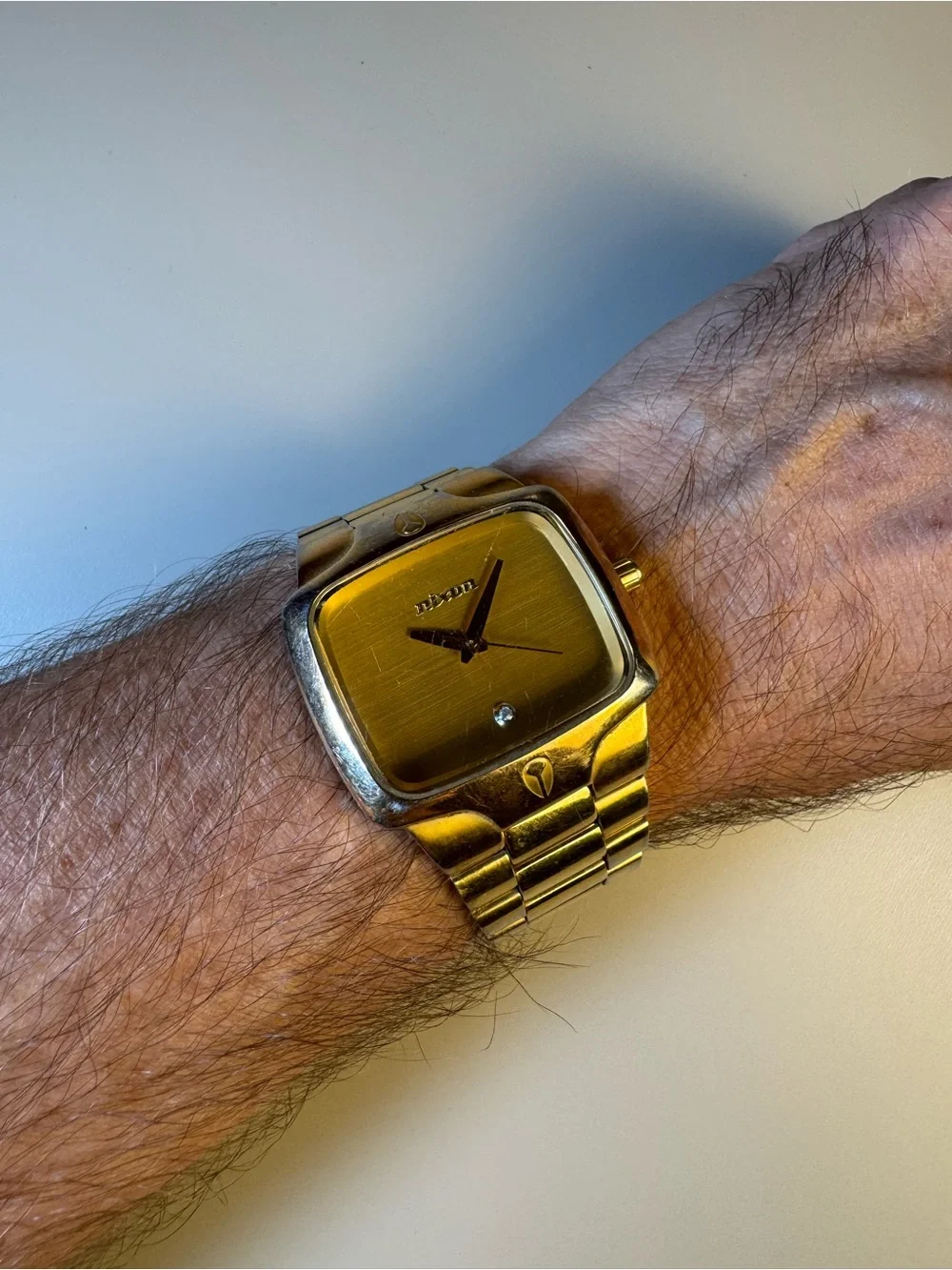 Nixon “The Player” Gold-Tone Square Dial Men's Bracelet Watch w/ real diamond.